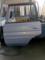 Фотография Дверь задняя левая MAZDA DEMIO 1999г.