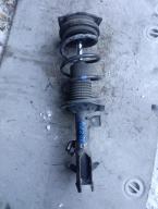 Фотография Стойка передняя левая NISSAN WINGROAD 2008г.