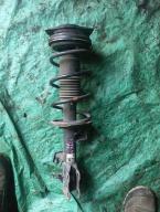 Фотография Стойка передняя левая NISSAN WINGROAD 2013г.