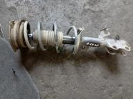 Фотография Стойка передняя правая NISSAN TIIDA 2010г.