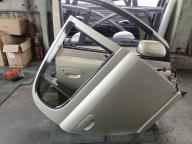Фотография Дверь задняя правая TOYOTA VITZ 2004г.
