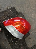 Фотография Стоп-сигнал правый TOYOTA VITZ 2009г.