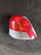 Фотография Стоп-сигнал левый TOYOTA VITZ 2010г.