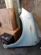 Фотография Крыло левое TOYOTA VITZ 2004г.