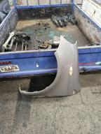 Фотография Крыло левое TOYOTA VITZ 2001г.