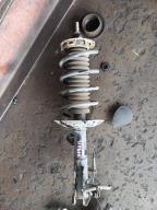 Фотография Стойка передняя левая HONDA FIT 2010г.