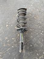 Фотография Стойка передняя левая TOYOTA VITZ 2001г.