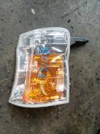 Фотография Поворотник к фаре левый NISSAN CARAVAN 2005г.