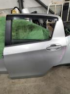 Фотография Дверь задняя левая TOYOTA VITZ 2012г.