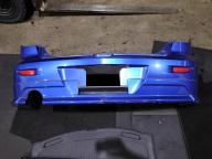Фотография Бампер задний MAZDA AXELA 2003г.