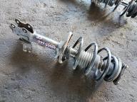 Фотография Стойка передняя правая NISSAN WINGROAD 2004г.