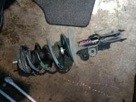 Фотография Стойка передняя левая TOYOTA PRIUS ALPHA 2012г.