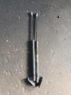 Фотография Амортизатор задней двери TOYOTA VITZ 2010г.
