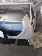 Фотография Крыло левое TOYOTA VITZ 2006г.