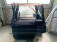 Фотография Дверь задняя левая MAZDA DEMIO 1996г.