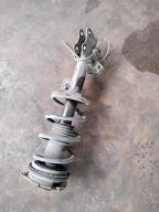 Фотография Стойка передняя левая NISSAN TIIDA 2006г.